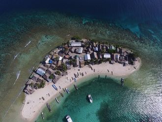 Pictured from 400 feet above is the entire island of Cayos Cochinos with a population of 200 residents